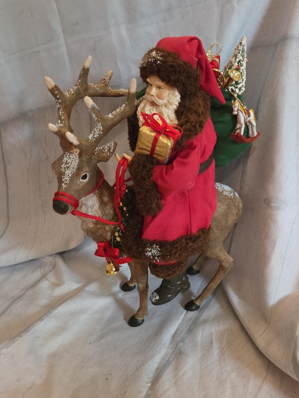 Santa Figure on Reindeer Holiday Decor - Red and Brown